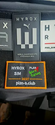 Hyrox SIM - Winners Badge in prime placing next to World Championship Patch
