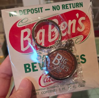 My Family owns a very small soda company in Pennsylvania and were celebrating our 100th year anniversary These bottle cap keychains were a limited item we got to help celebrate this massive milestone The backing is one of our old labels from the 1960s