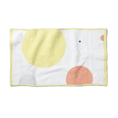 A personalized beach towel with an abstract design of pastel circles on a light background, suitable for a unique summer accessory.